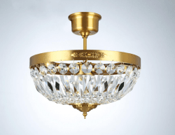 Rhea Ø35 Latón cepillado cristal De Norrsken Design - Esta exclusiva lámpara de araña de cristal está decorada con cristal K9 de grado 1 cortado a mano, que crea un juego de luz brillante que realza la atmósfera de la habitación.