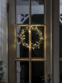 Corona LED Ø30 Plata De Konstsmide - Sus 32 peque&ntilde;os LED emiten una luz amarilla c&aacute;lida y acogedora, creando un ambiente confortable.