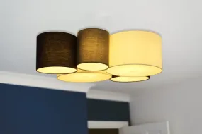 Makki 90cm Multicolor plafón De Globo Lighting - Lampan har en unik design med fem cylindriska textilsk&auml;rmar i olika storlekar, varav tv&aring; &auml;r vita, tv&aring; svarta och en gr&aring;.