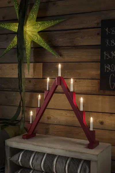 Candelabra 7 Lights ROJO De Konstsmide - Candelabro el&eacute;ctrico plegable con 7 velas, fabricado en madera lacada en rojo, decorado con aros de lat&oacute;n alrededor de cada vela para un toque elegante.