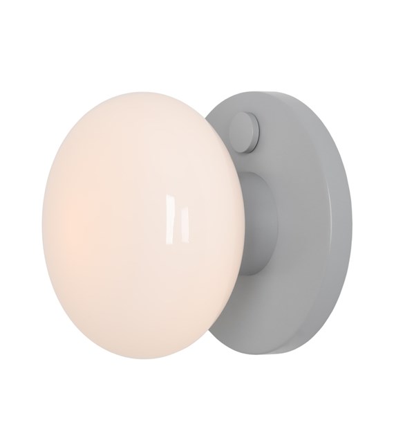 Flo Ø20 Gris lámpara de pared De Artera - El aplique Flo, fabricado en metal gris con pantalla de cristal blanco, presenta un diseño moderno y elegante que emite una luz suave y agradable.