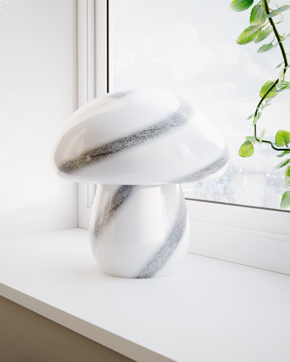 Mira Mushroom 30cm Blanco/negro lámpara de mesa De By Rydéns - La l&aacute;mpara no es solo una fuente de luz funcional, sino tambi&eacute;n un detalle art&iacute;stico que resalta su interior con su dise&ntilde;o inspirado en la naturaleza y su calidad artesanal.