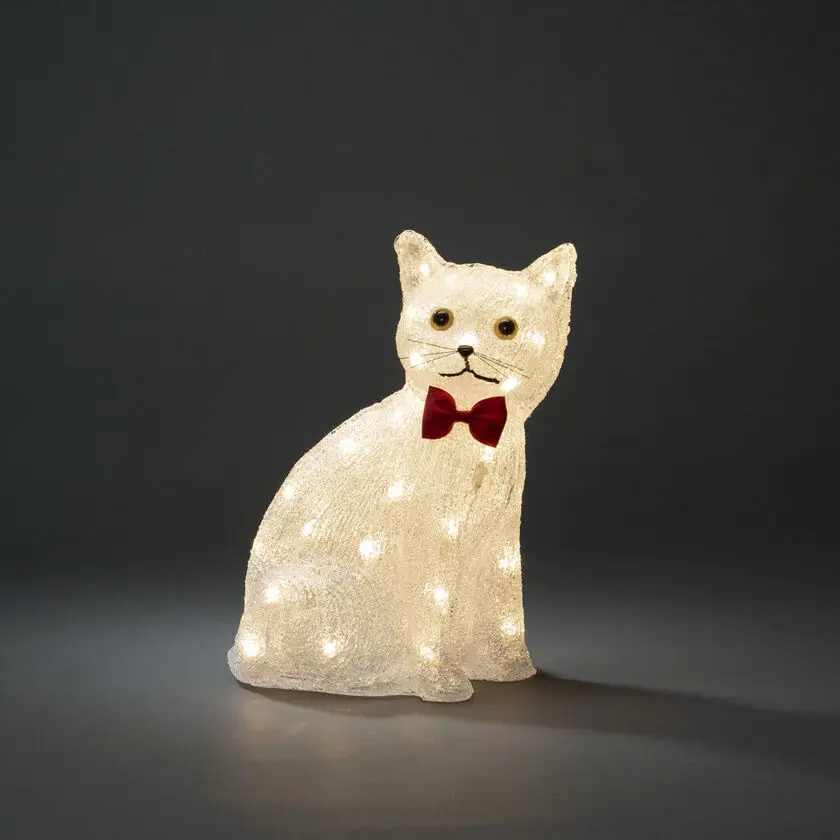 Gato Sentado De Acrílico Claro De Konstsmide - Encantador y juguet&oacute;n: este gato de acr&iacute;lico sentado difunde calidez con sus 40 luces LED de color blanco c&aacute;lido.