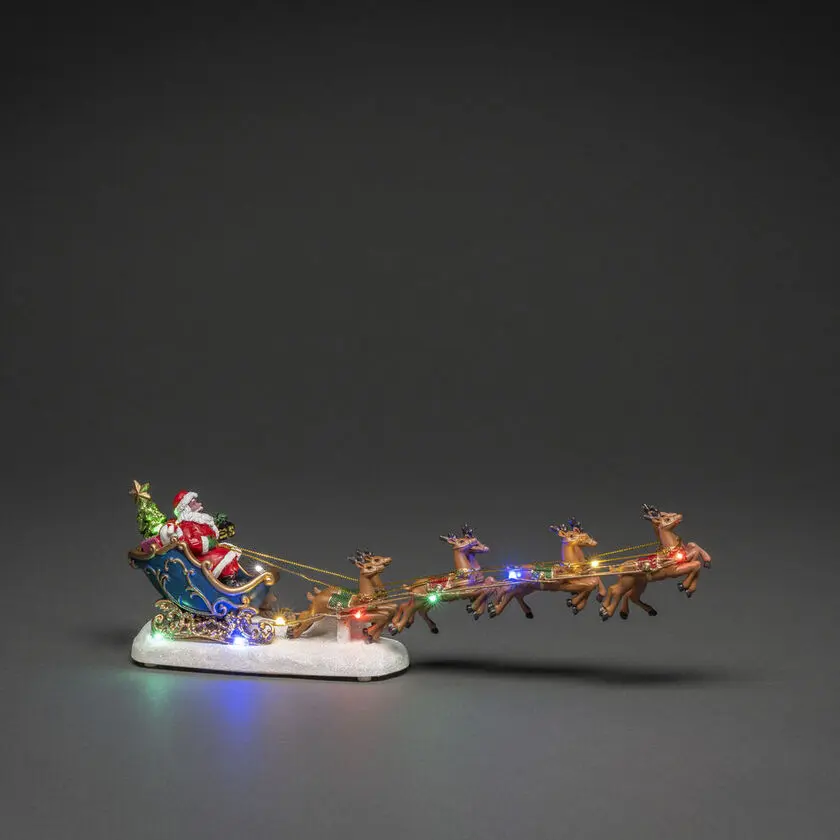 Papá Noel Con Renos 14cm Multicolor De Konstsmide - Perfecto para llamar la atenci&oacute;n en la mesa o en el alf&eacute;izar de la ventana.