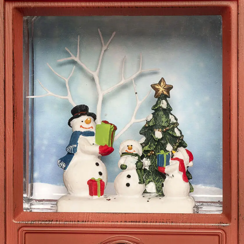 Linterna Rellena De Agua Con Forma De Televisor Marrón De Konstsmide - Esta linterna llena de agua con forma de televisor retro muestra un paisaje invernal con mu&ntilde;ecos de nieve y un &aacute;rbol de Navidad decorado.