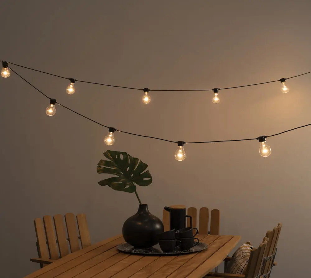 Guirnalda luminosa, LED ámbar, 10m Negro De Konstsmide - Cadena de luces decorativas con 20 luces LED de color &aacute;mbar que crean un ambiente c&aacute;lido y acogedor.