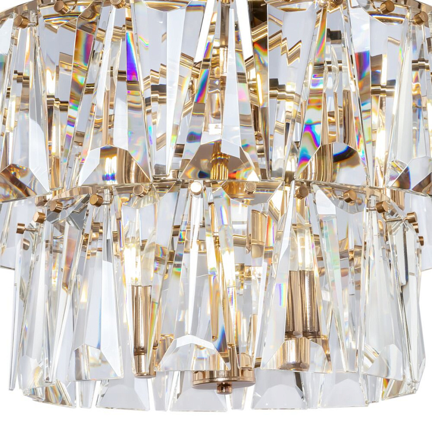 Puntes Ø77 Oro cristal De Maytoni - Puntes es una elegante l&aacute;mpara de techo realizada en metal de color dorado con prismas brillantes que rodean las fuentes de luz y crean un m&aacute;gico juego de luz cuando se enciende la l&aacute;mpara.
