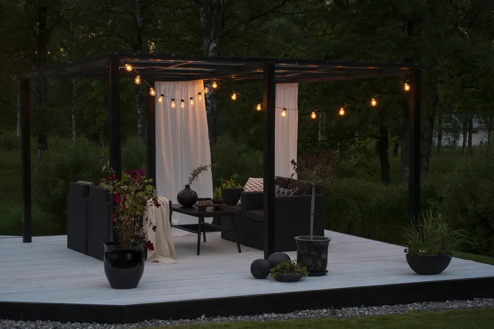 Guirnalda luminosa, LED ámbar, 10m Negro De Konstsmide - Cadena de luces decorativas con 20 luces LED de color &aacute;mbar que crean un ambiente c&aacute;lido y acogedor.