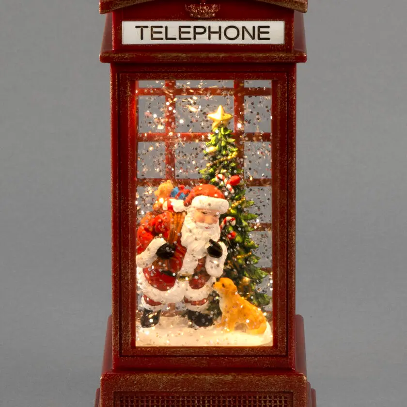 Linterna Rellena De Agua cabina telefónica ROJO De Konstsmide - En el interior, el brillo gira alrededor de una escena de Pap&aacute; Noel iluminada, creando una sensaci&oacute;n m&aacute;gica.