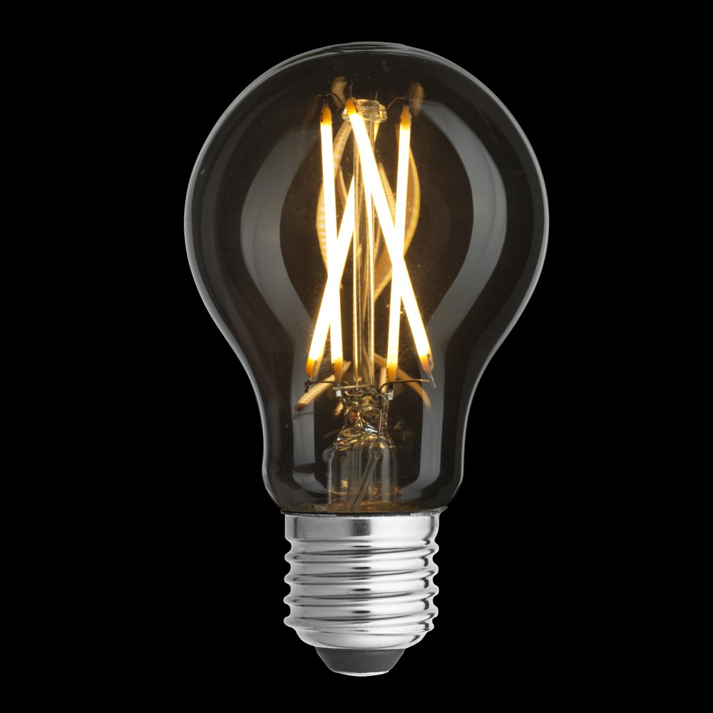 E27 normal 6W 2700K Transparente De Unison - Con una potencia de 6 W y una luz c&aacute;lida y acogedora de 2700 K, esta bombilla ofrece el mismo brillo que las bombillas incandescentes convencionales, pero con un consumo de energ&iacute;a significativamente menor.