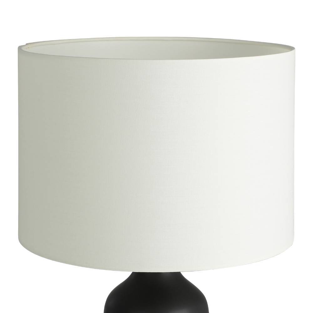 Vinoza 53cm Negro lámpara de mesa De Eglo - Con una base negra decorada con líneas minimalistas que representan a una mujer con sombrero, la lámpara añade un toque sofisticado y artístico a su hogar.