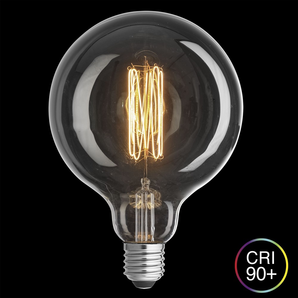 E27 Globo 2W 2200K Regulable Transparente De Unison - El dise&ntilde;o cl&aacute;sico y el filamento en espiral de la fuente de luz la hacen ideal para luminarias abiertas e instalaciones decorativas donde tanto la est&eacute;tica como la calidad de la luz son primordiales.