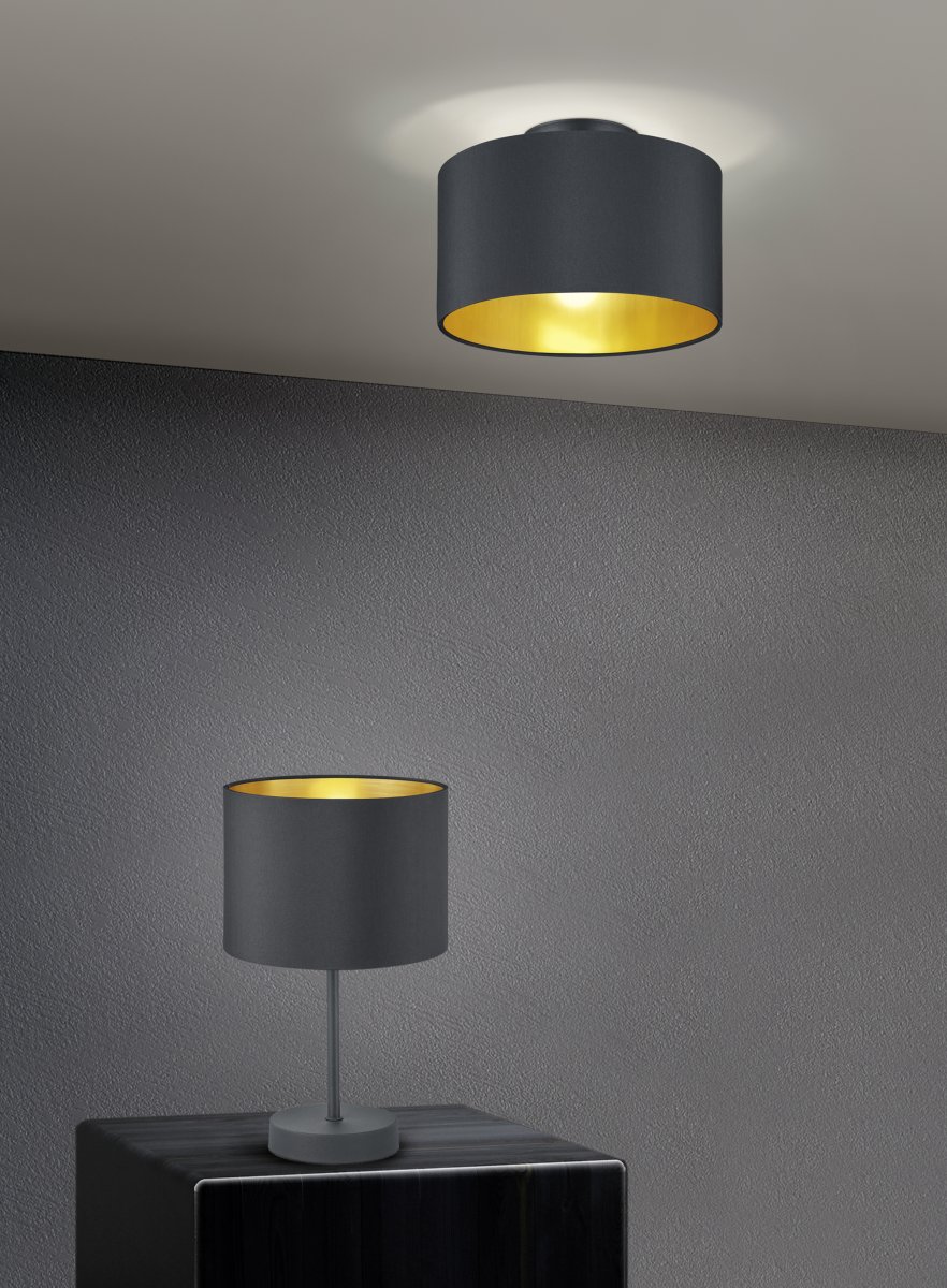 Hostel 33cm Negro lámpara de mesa De Trio Lighting - La combinación de colores negro y dorado luce elegante y sofisticada y ofrece un efecto de iluminación fantástico.