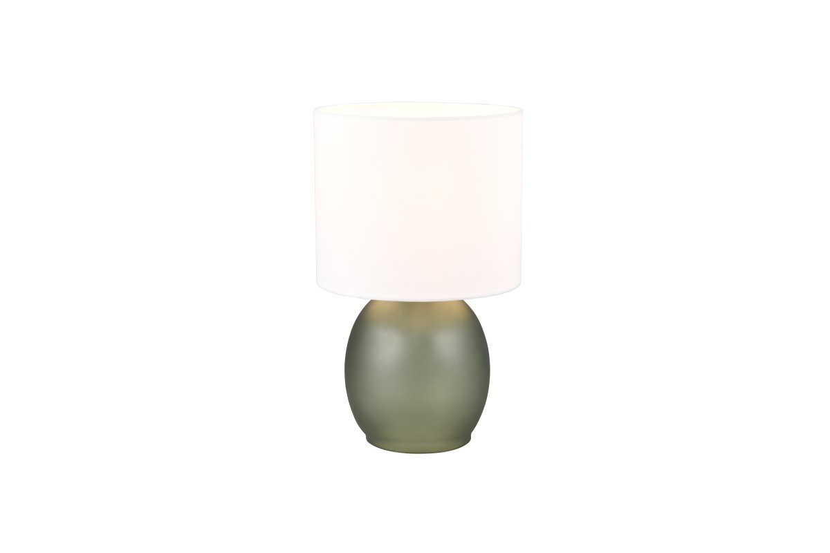 Vela 30cm Verde lámpara de mesa De Trio Lighting - La lámpara de mesa presenta una elegante pantalla de tela y una base de vidrio redondeada y bien formada, que juntas crean una impresión armoniosa.
