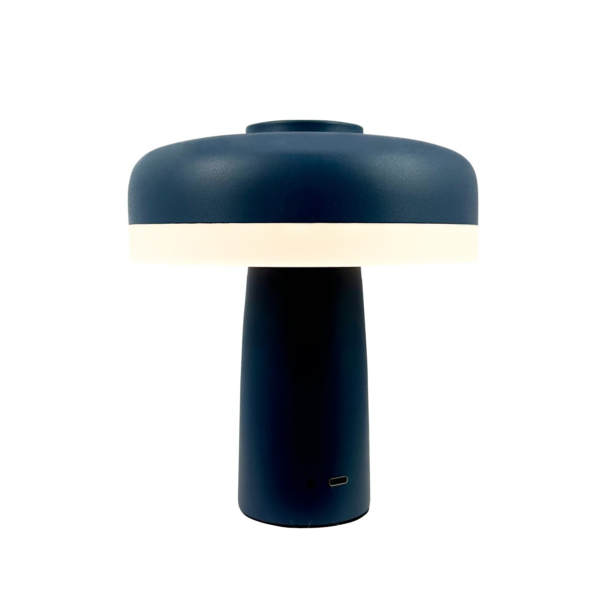 Porter 16cm Índigo portátil De Dyberg Larsen - La lámpara de mesa LED recargable Porter es una lámpara moderna y funcional con un diseño único en el que la luz nace desde el borde, proporcionando una luz agradable y uniforme.