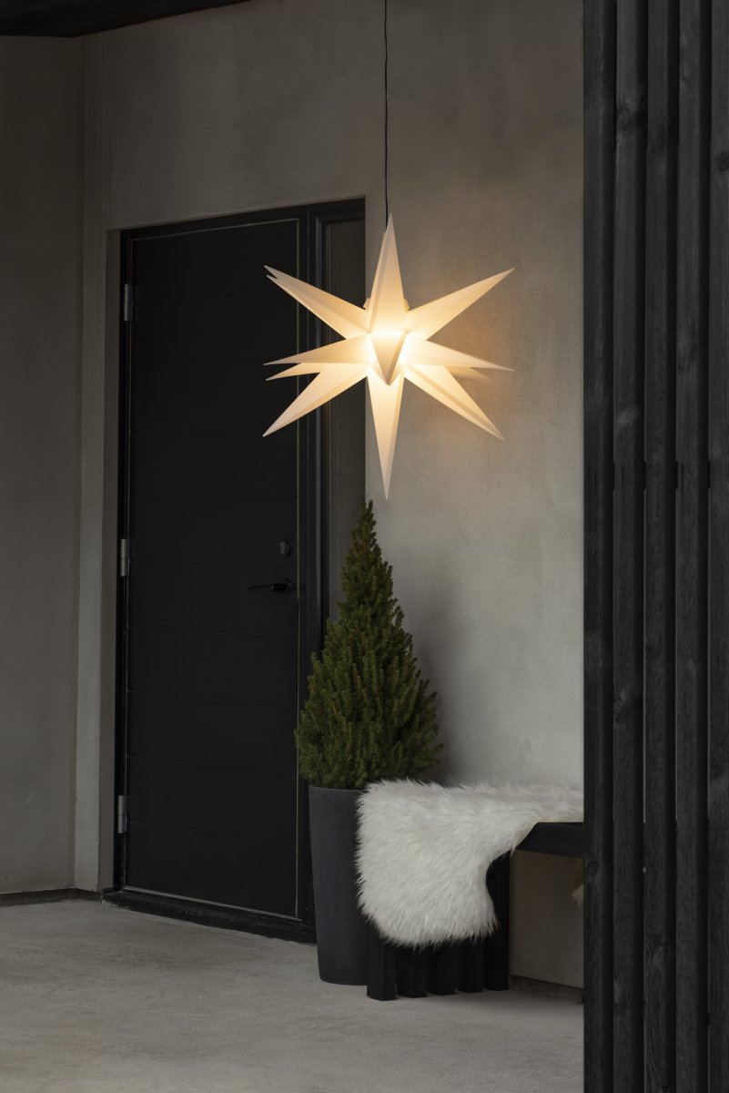 Estrella 3D Ø80 Blanco De Konstsmide - Incluye un casquillo G4, una bombilla LED G4 reemplazable, un cable de pl&aacute;stico negro de 5 metros y un transformador.