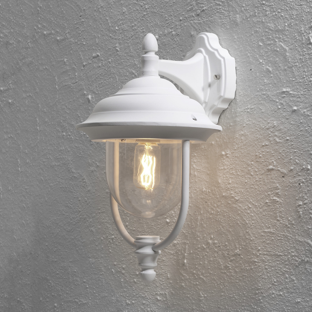 Parma Blanco lámpara de exterior De Konstsmide - Con su hermosa forma y pantalla de cristal transparente, difunde una luz c&aacute;lida y acogedora, ideal para entradas y patios.
