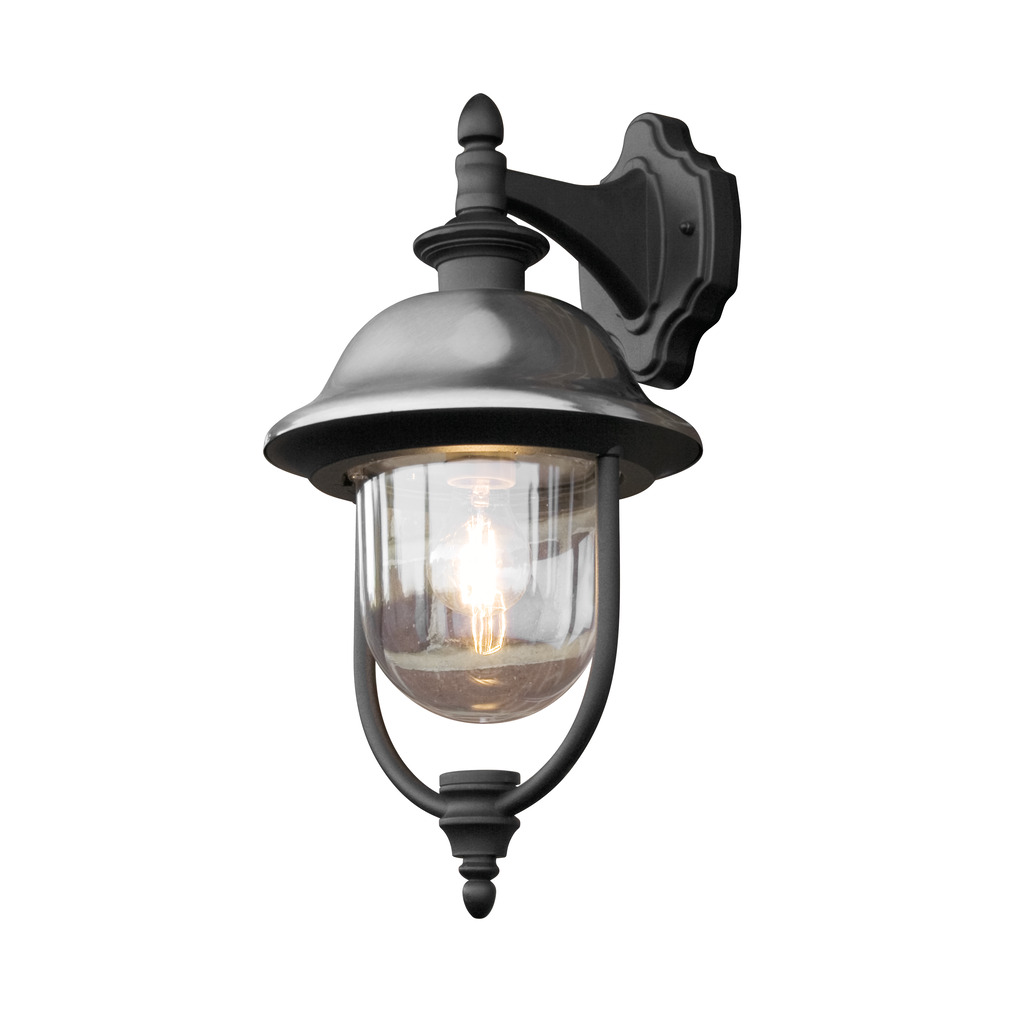Parma Negro lámpara de exterior De Konstsmide - Con su robusta superficie negra y su pantalla de cristal transparente, emite una luz cálida y acogedora, creando un ambiente acogedor en la entrada o en la terraza.