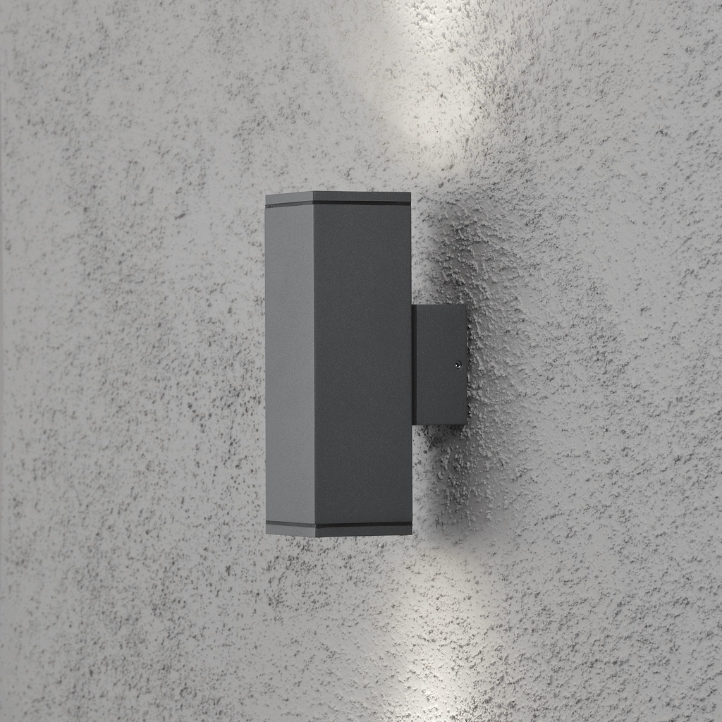Monza Gris oscuro lámpara de exterior De Konstsmide - Cree una solución de iluminación elegante y moderna en su fachada con este aplique de pared gris oscuro que brilla tanto hacia arriba como hacia abajo.