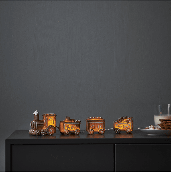 Gingerville Marrón De Star Trading - El set incluye una locomotora con tres vagones y una guirnalda de luces.