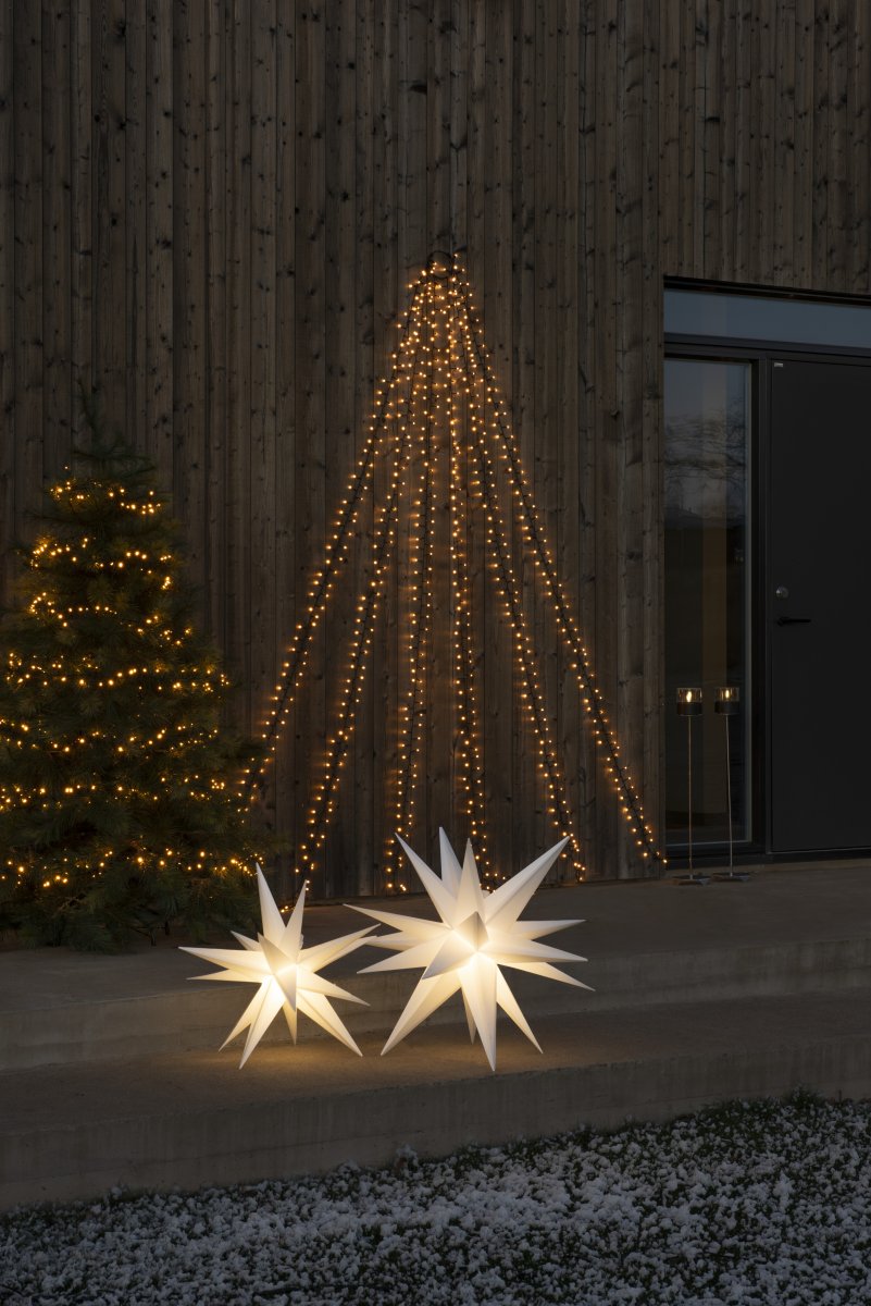 Estrella 3D Ø80 Blanco De Konstsmide - Incluye un casquillo G4, una bombilla LED G4 reemplazable, un cable de pl&aacute;stico negro de 5 metros y un transformador.