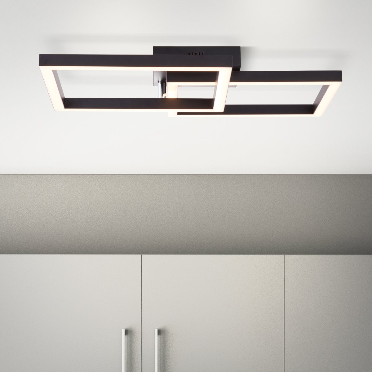 Kjorn 50cm Negro plafón De Brilliant - Su marco negro y dos cuadrados con LED integrados emiten una luz brillante que se puede atenuar en tres pasos con el interruptor de pared.