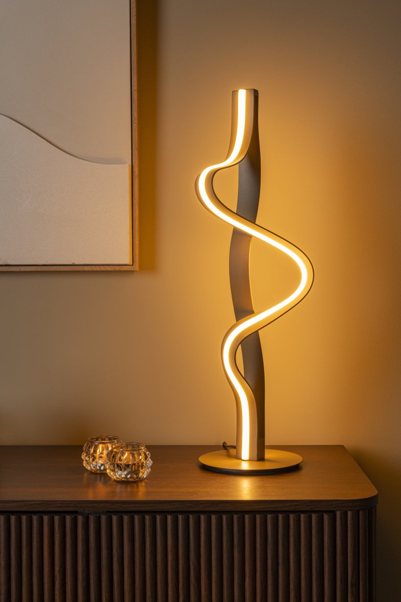 Lambada 60cm Champán lámpara de mesa De Lucide - Lambada es una elegante l&aacute;mpara de mesa met&aacute;lica con un exclusivo acabado color champ&aacute;n y una forma suave y org&aacute;nica que llama la atenci&oacute;n al instante.