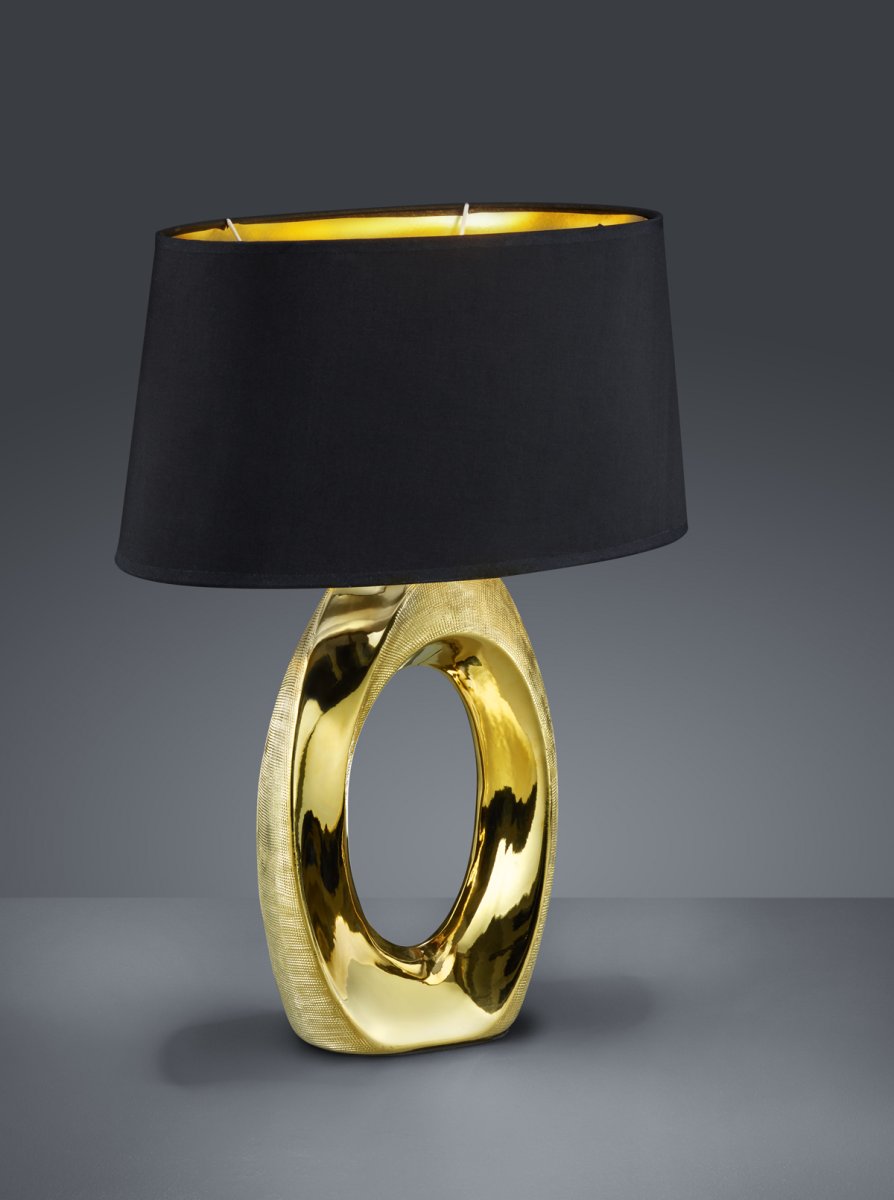 Taba 52cm Oro lámpara de mesa De Trio Lighting - La lámpara de mesa de cerámica TABA combina un diseño moderno con elegantes combinaciones de colores y se convierte en una auténtica joya en cualquier estancia.