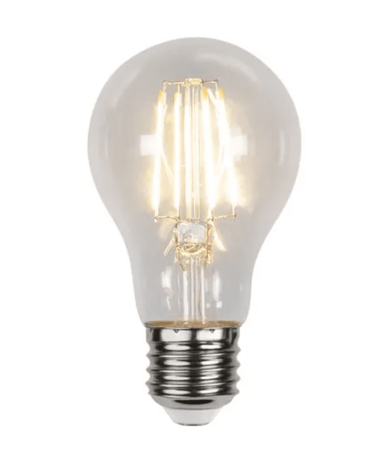 E27 normal sensor 7W 2200K Transparente De Unison - Con su luz c&aacute;lida y suave, esta fuente de luz es perfecta para instalaciones decorativas donde el estilo y la funci&oacute;n van de la mano.